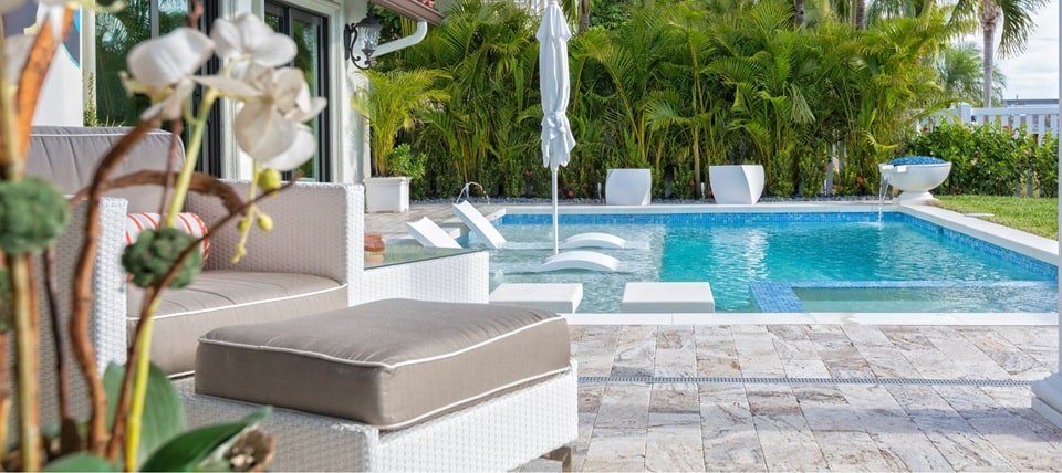 outdoor pool with shower and benches