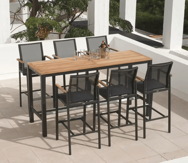 aura 7 pc bar patio dining chair set in a patio