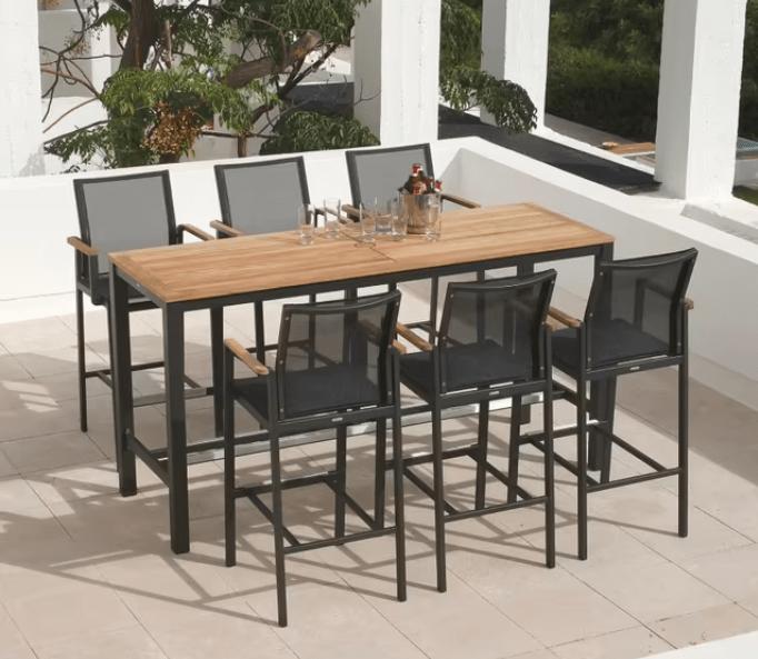 aura 7 pc bar patio dining chair set in a patio