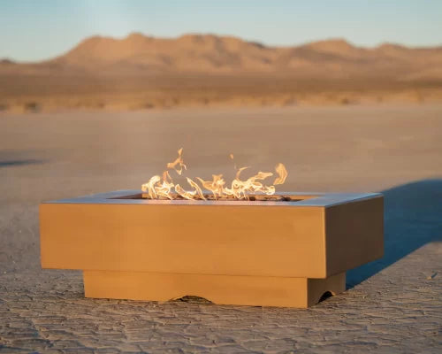 an image del mar fire pit with flames in the middle of the desert