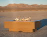 an image del mar fire pit with flames in the middle of the desert