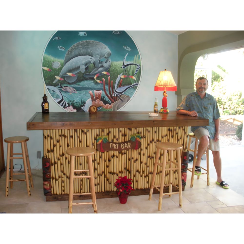 White_Sands_Islander_no_roof_outdoor_tiki_bar_inside_with_guy_sitting