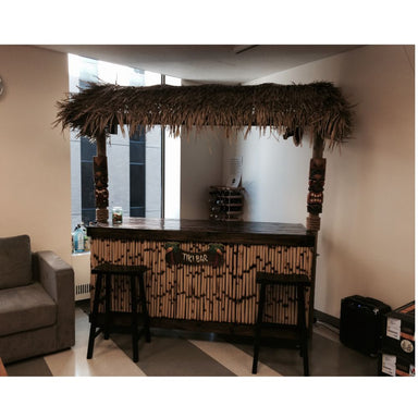 White_sands_Islander_with_top_outdoor_tiki_bar_in_corner_of_room